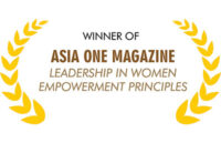 A certificate with a gold laurel design, text reading "Winner of Asia One Magazine Leadership in Women Empowerment Principles."