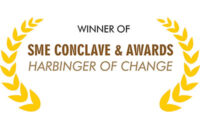 A certificate with a gold laurel design, text reading "Winner of SME Conclave & Awards Harbinger of Change."