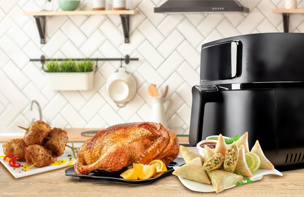 Air fryer chicken dishes on a plate with crispy finish.